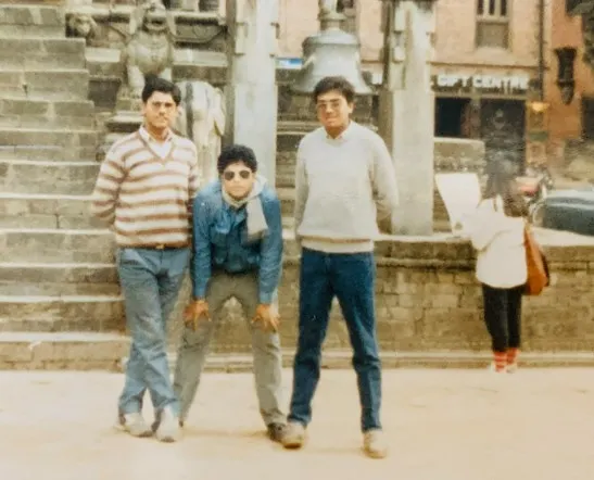 Friends standing on temple steps in Nepal, 1984